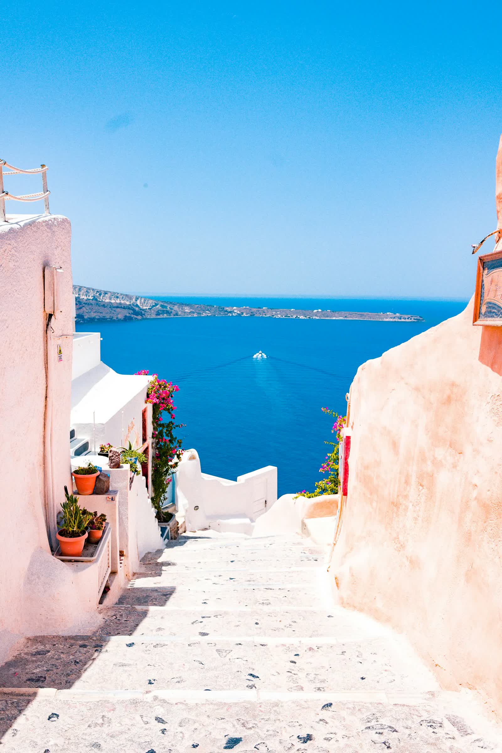 Whitewashed Andalusian passage opening onto the Mediterranean